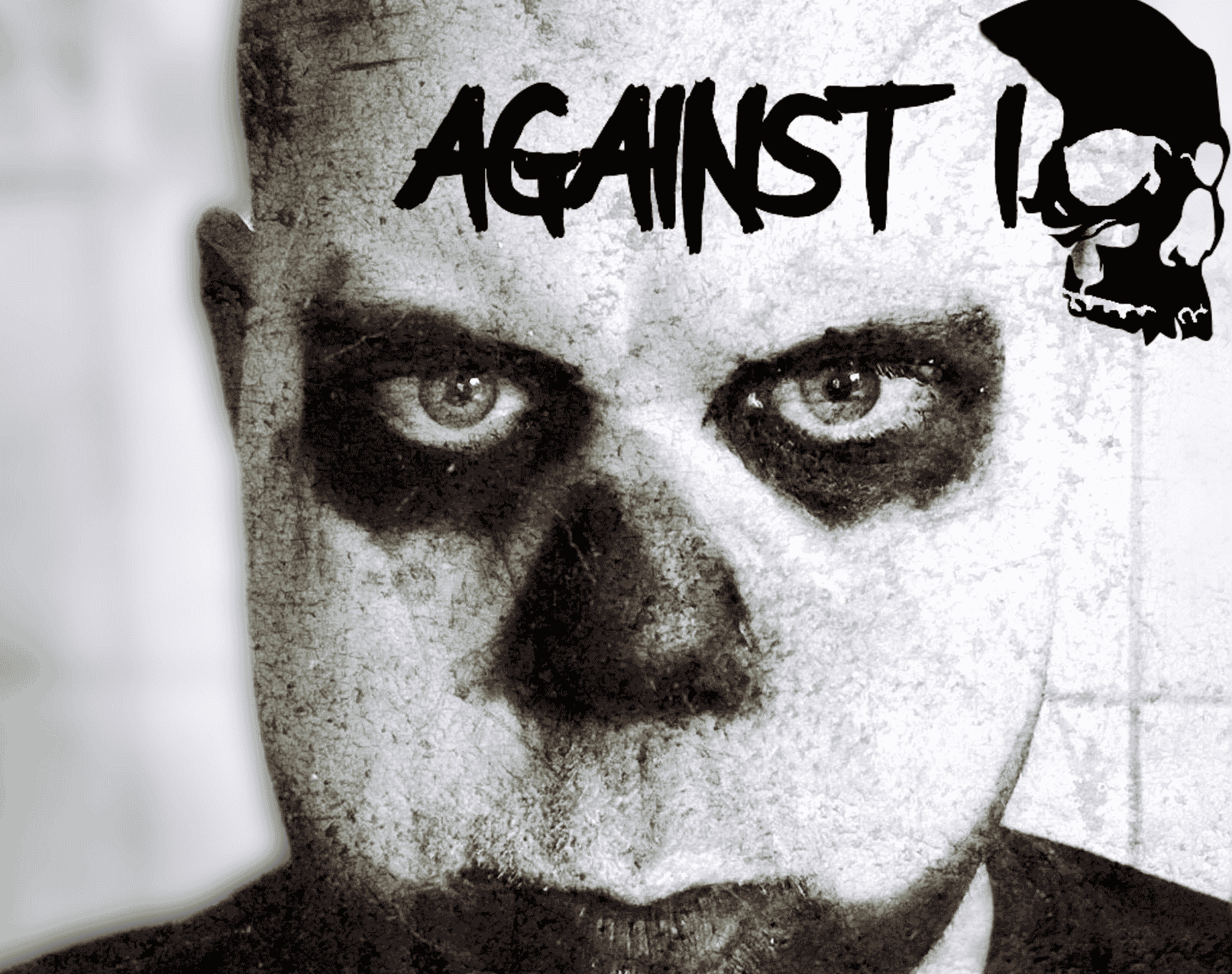 A man with a skull on his face, proudly displaying the words "against I.