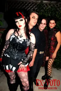 A group of people in gothic outfits.