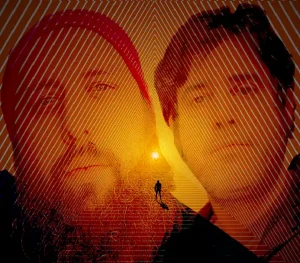 Two men with beards standing in front of a sunset.