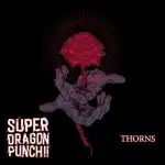 Album cover with a dark background featuring a skeletal hand holding a red rose. Text reads "SUPER DRAGON PUNCH!!" and "THORNS.