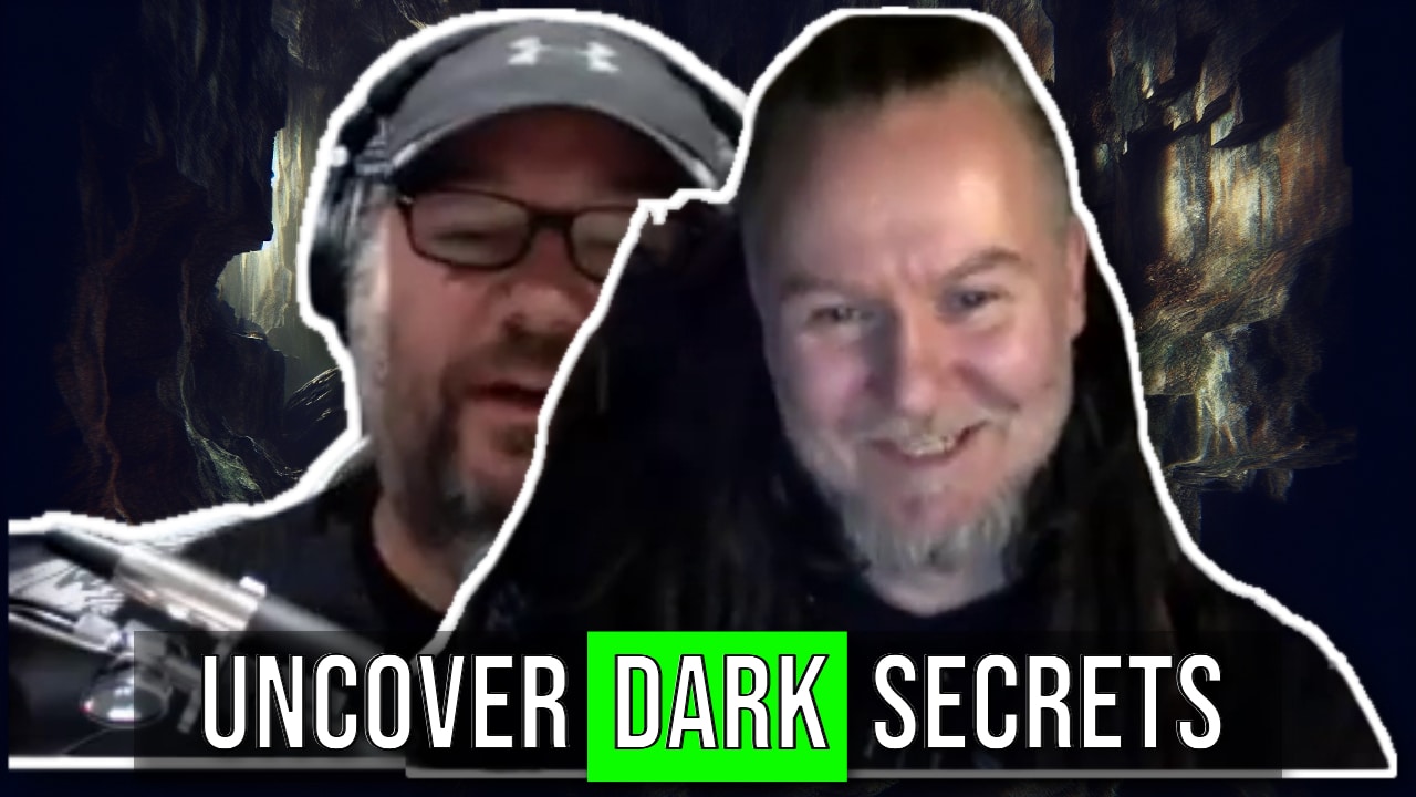 Two men in a split-screen video call with the text "UNCOVER DARK SECRETS" in front of a dark, mysterious background. Both men are smiling; one wears headphones and a cap, the other has long hair. This could be the lost interview with Mortiis you've been waiting for.